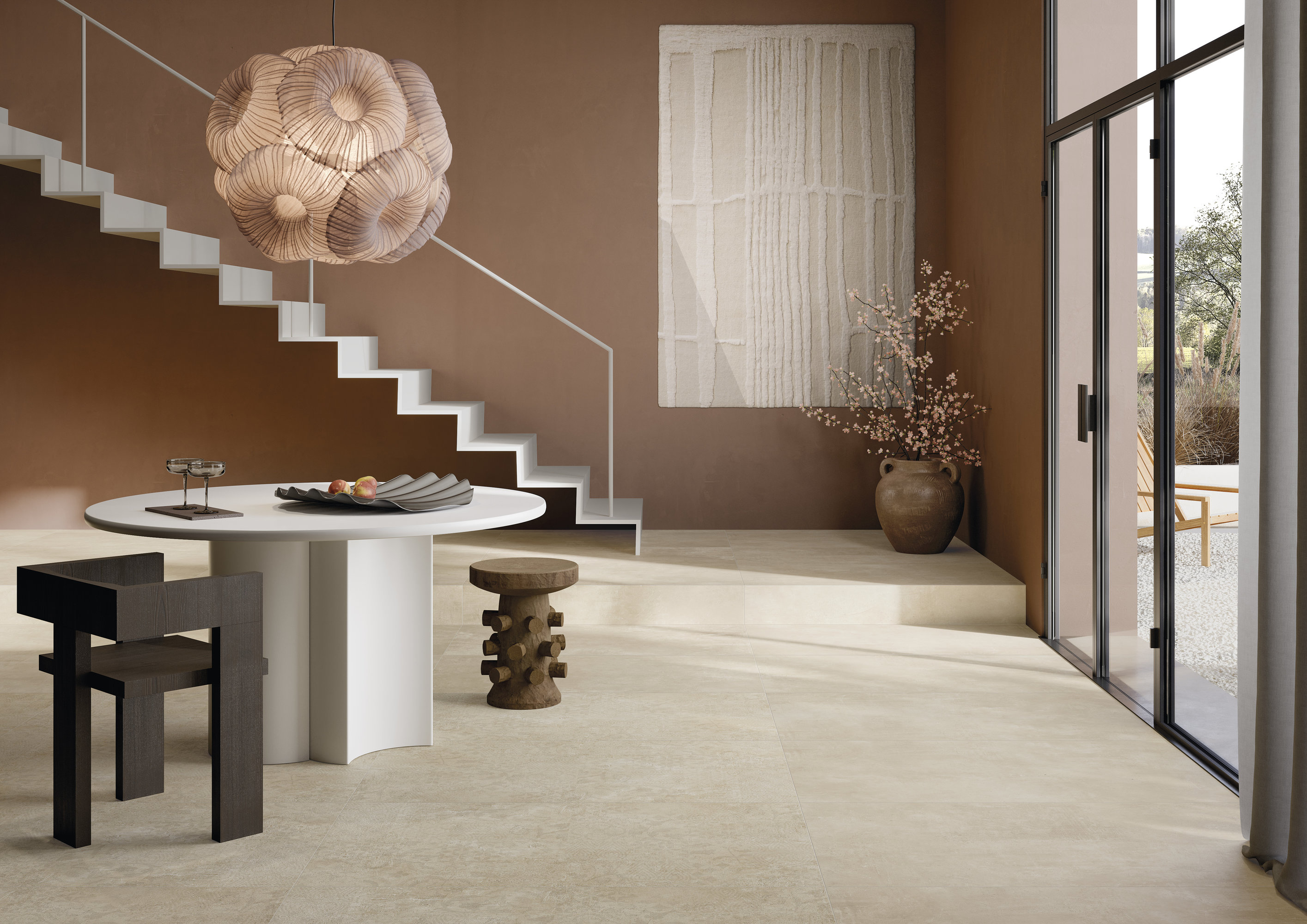 High-quality light beige tiles for an elegant interior with terrace access.