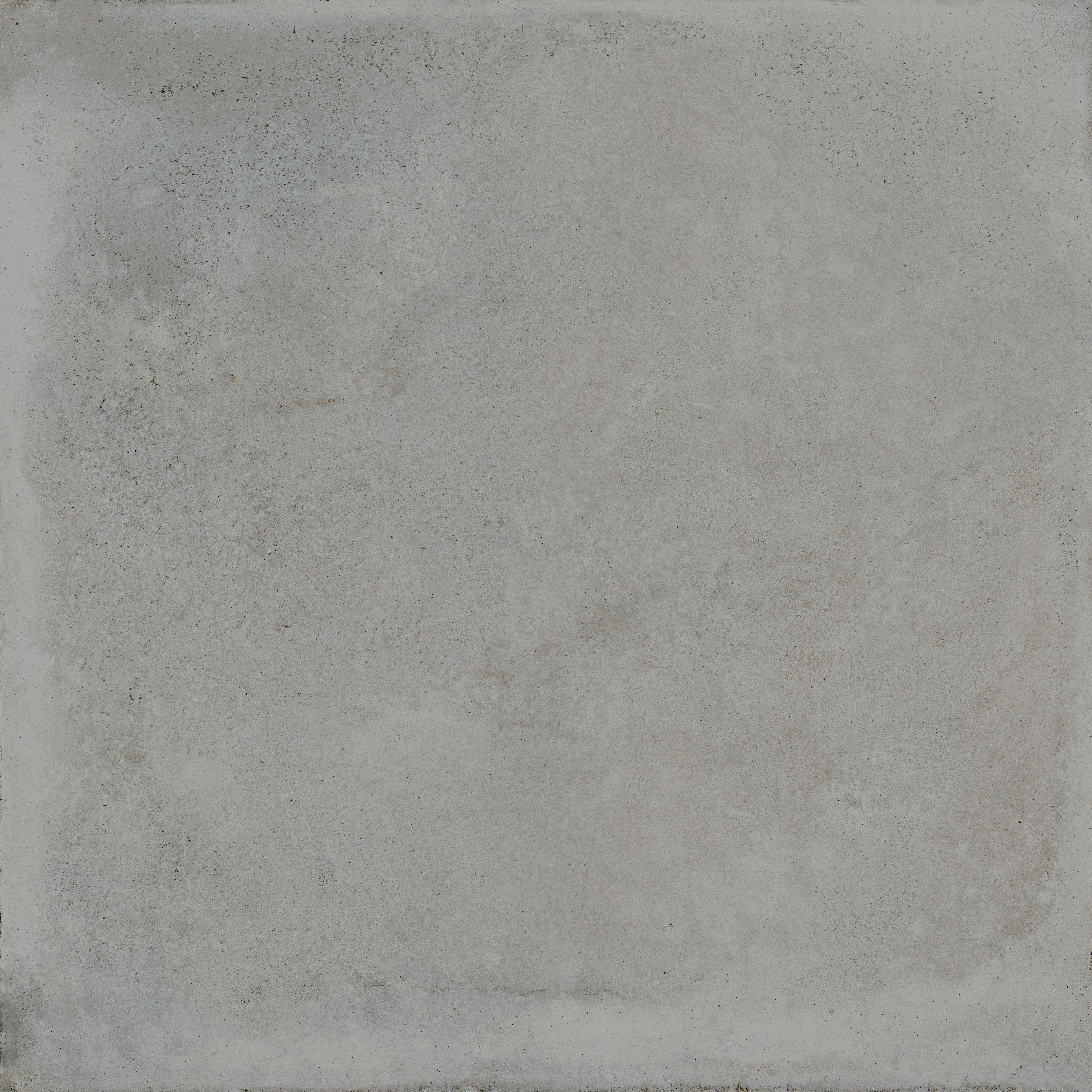 : Dark grey concrete-look tile.