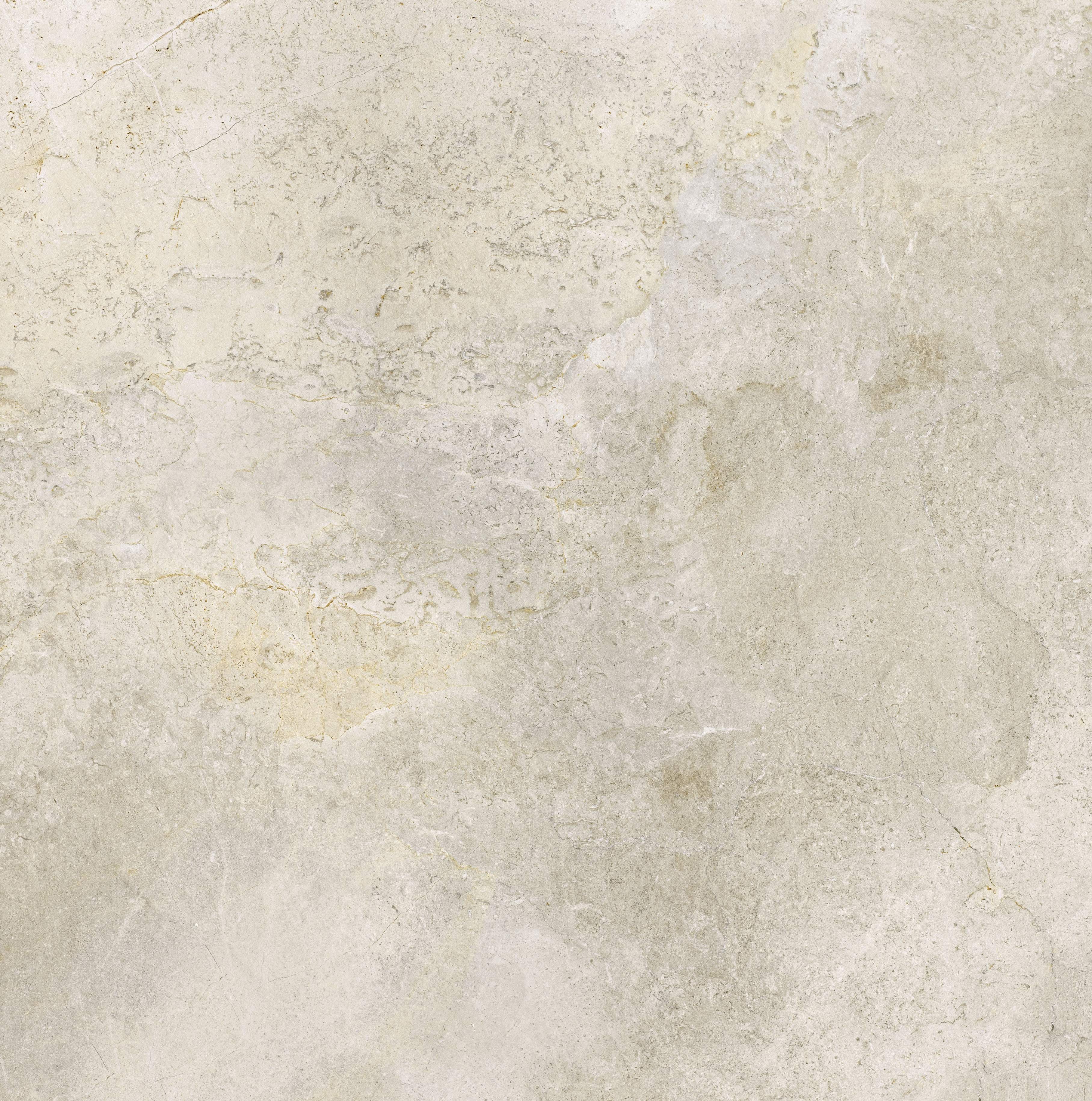 : Close-up of a light beige tile with a fine texture.