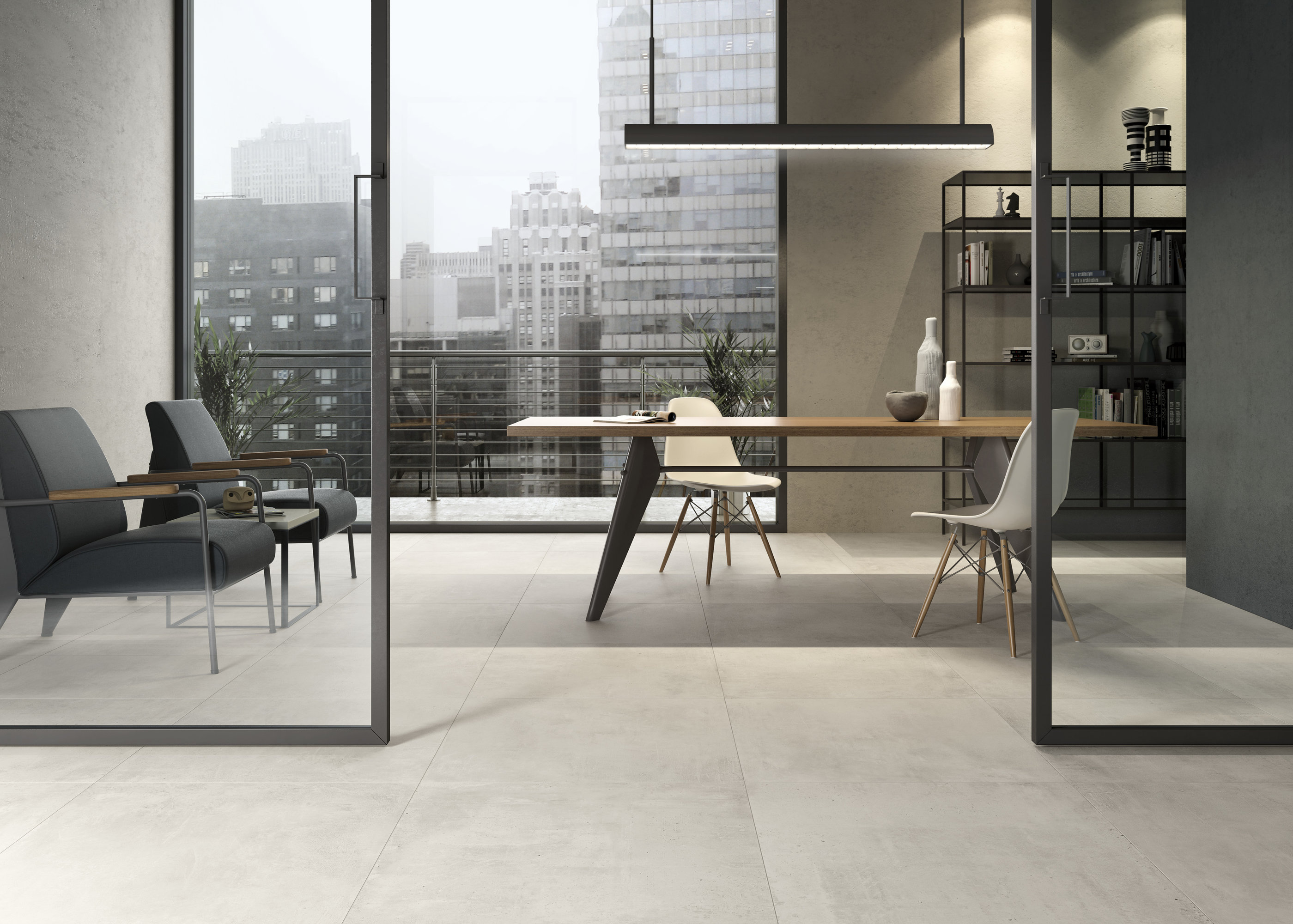 Helle, großformatige Fliesen in modernem Büro oder Wohnraum mit Stadtpanorama.