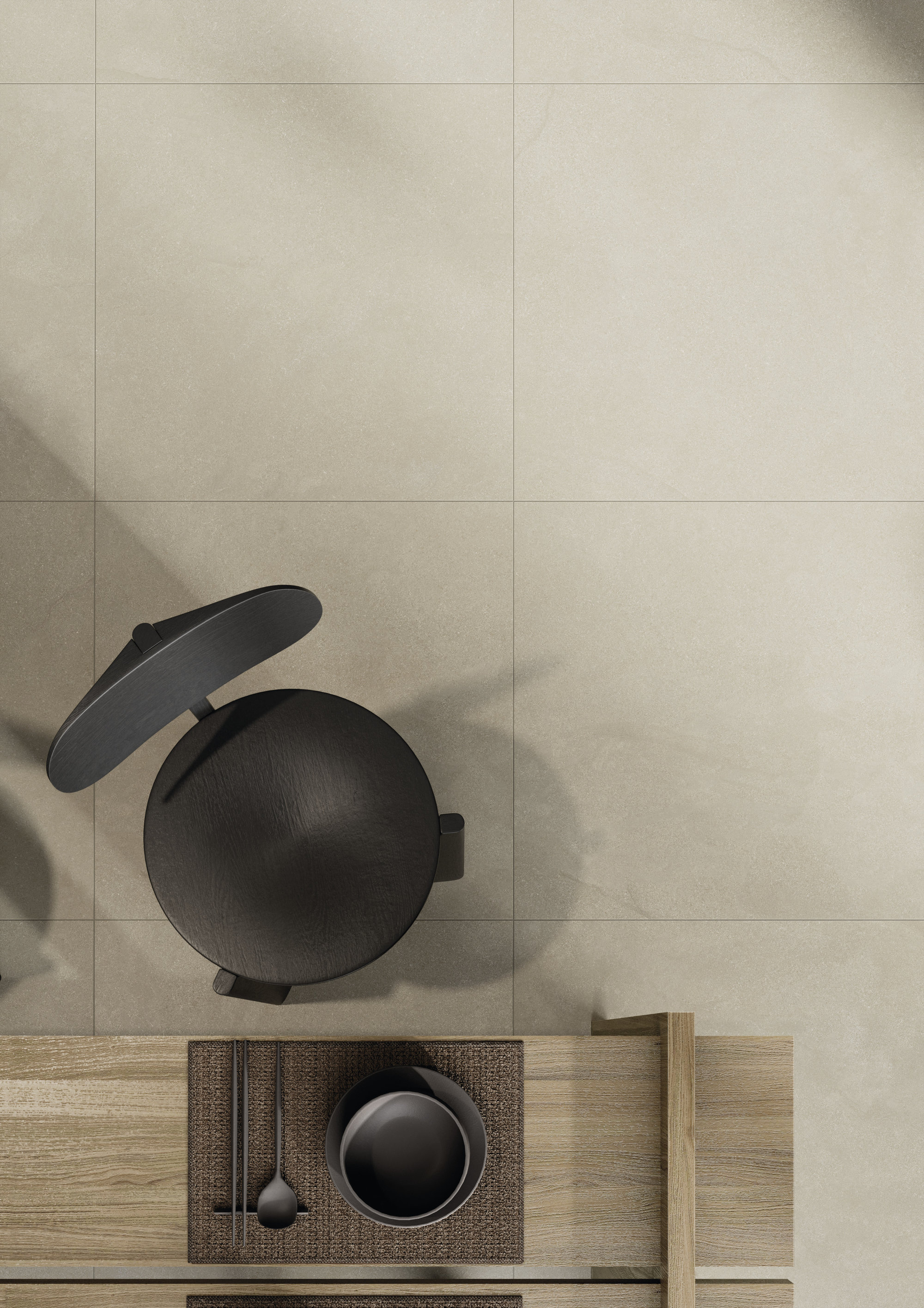 Helle, großformatige Fliesen in Betonoptik für moderne Innenräume.