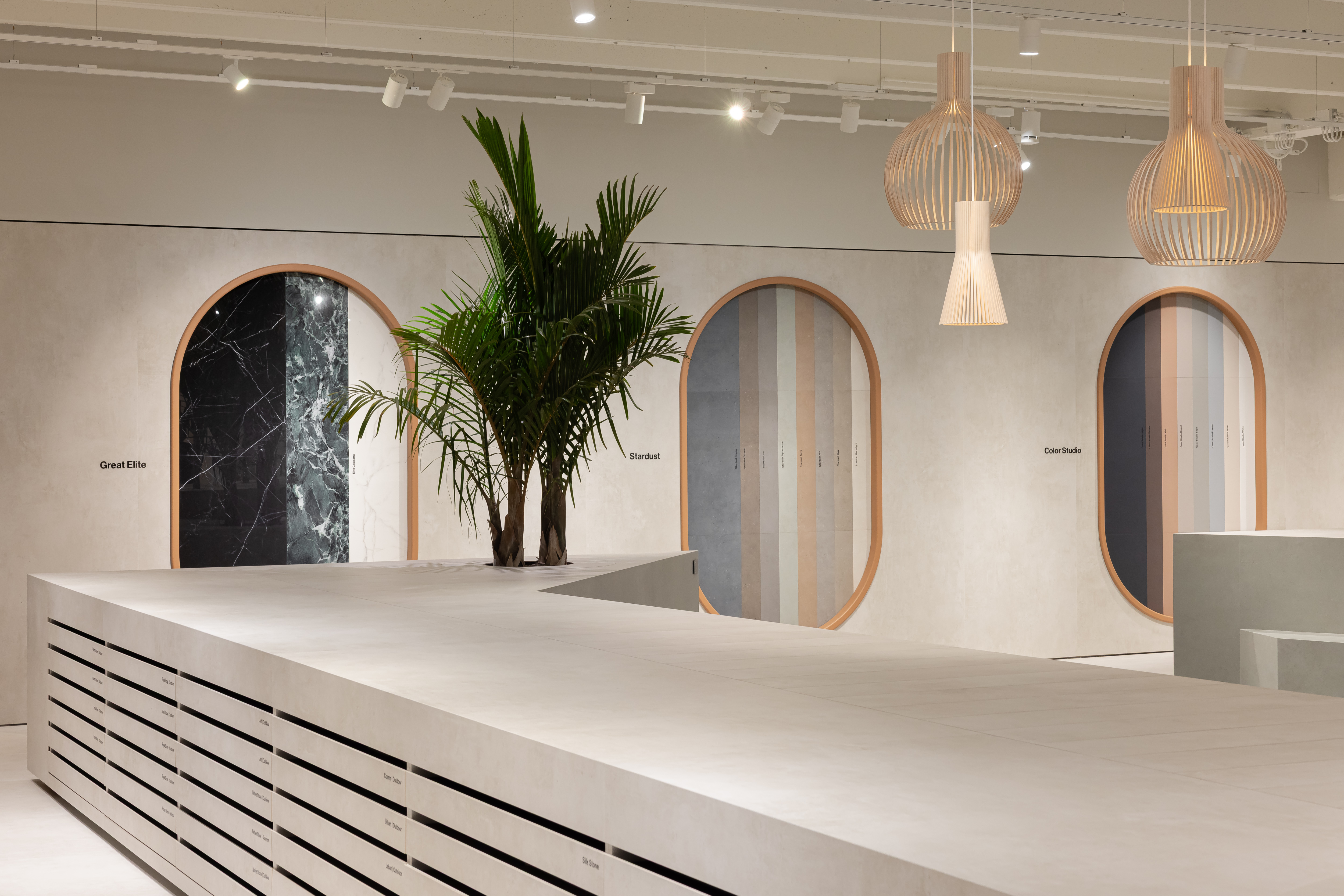 Wide range of premium indoor & outdoor tiles in a modern showroom.