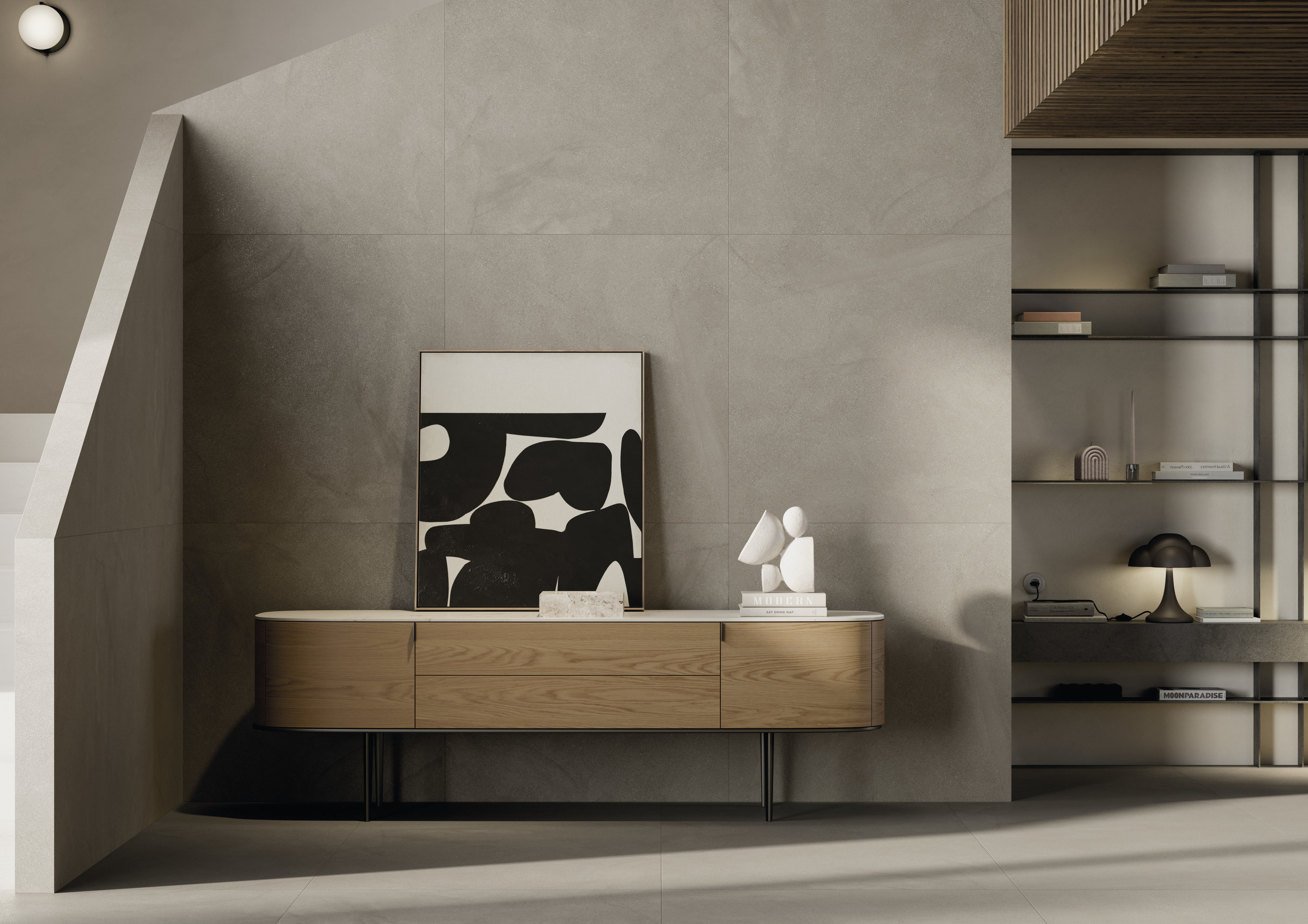 Helle, großformatige Feinsteinzeugfliesen an Wand und Boden in einem modernen Eingangsbereich.